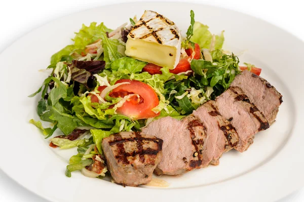 Veal meat with fresh vegetable salad — Stock Photo, Image