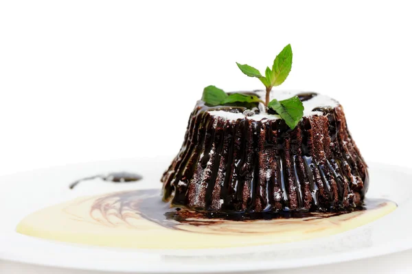 Chocolade fondant met pepermunt bladeren — Stockfoto