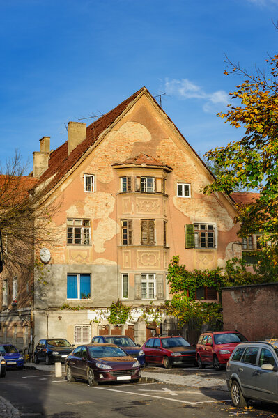 Old fashioned house at street, Brasov, Romania