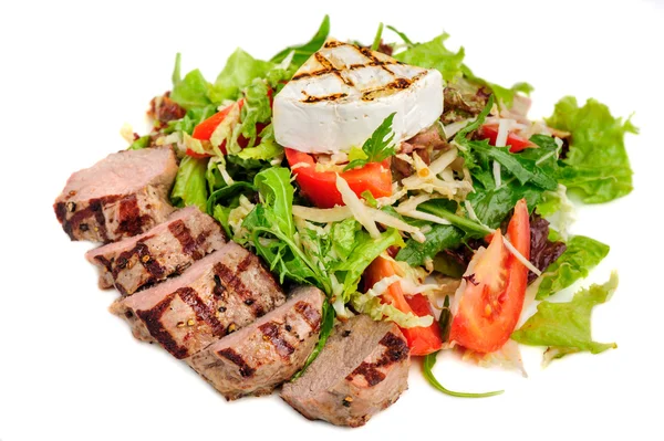 Veal meat with fresh vegetable salad — Stock Photo, Image