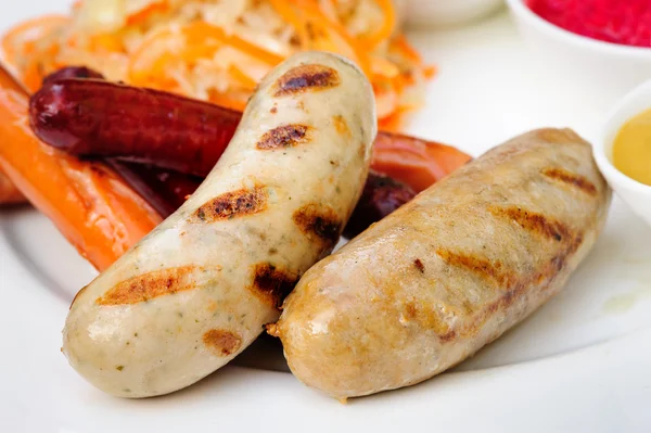 German sausage with cabbage and sauces — Stock Image German sausage with cabbage and sauces Stock Picture