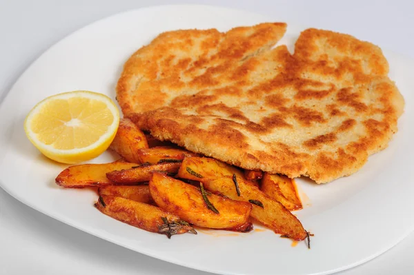 Costeleta de porco frita com batata — Fotografia de Stock