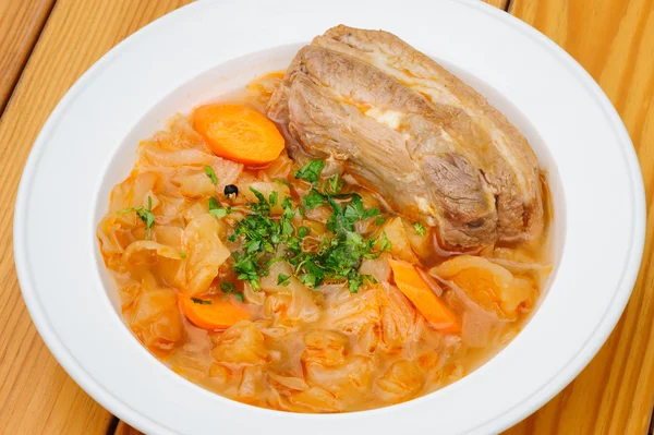 Stewed cabbage with pork meat — Stock Photo, Image