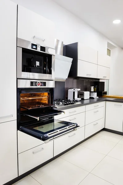 Modern hi-tek kitchen, oven with door open — Stock Photo, Image