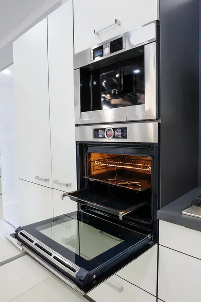 Modern hi-tek kitchen, oven with door open — Stock Photo, Image