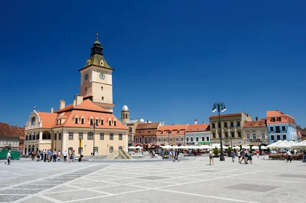 Det gamle rådhus og rådhuspladsen Brasov - Stock-foto