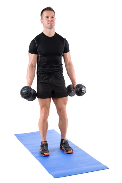 Young man shows starting position of biceps curl Stock Picture