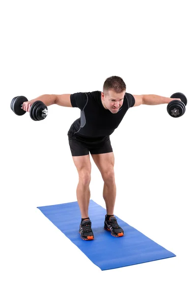 In piedi piegato sopra Dumbbell Reverse Fly Allenamento — Foto Stock