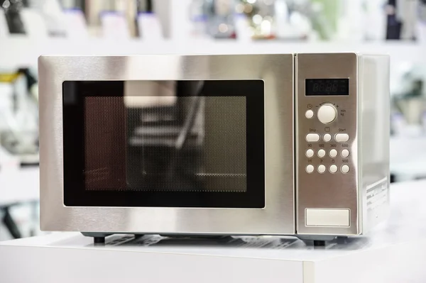 Microwave oven in retail store — Stock Photo, Image