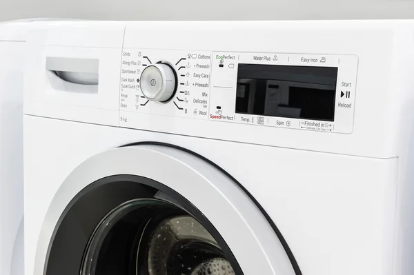 Close up de lavandaria ou máquina de lavar roupa — Fotografia de Stock