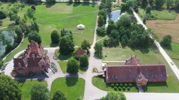 Jaunmoku Brick Medieval Castle Tukums Latvia Pond Fontain Clear Sunny — Stock Video