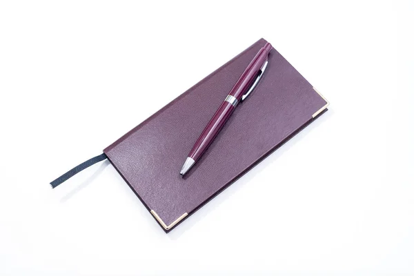 Purple Pen Purple Cover Notebook Witte Achtergrond — Stockfoto