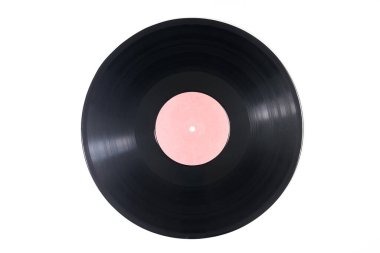 Beyaz arka planda izole edilmiş eski siyah vinil plaklar. Kırpma yolu ile. Siyah vinil plak - Pembe etiketli klasik müzik çalar