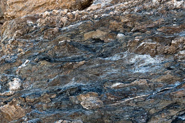 Textura Superfície Rocha Vulcânica Escura Com Manchas Coloridas Formações Rochosas — Fotografia de Stock