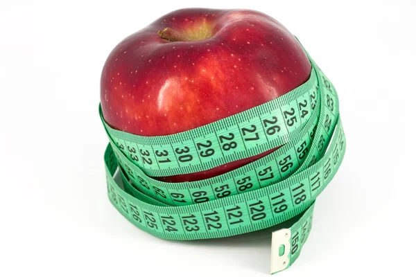 Kırmızı elma ve ölçer — Stok fotoğraf