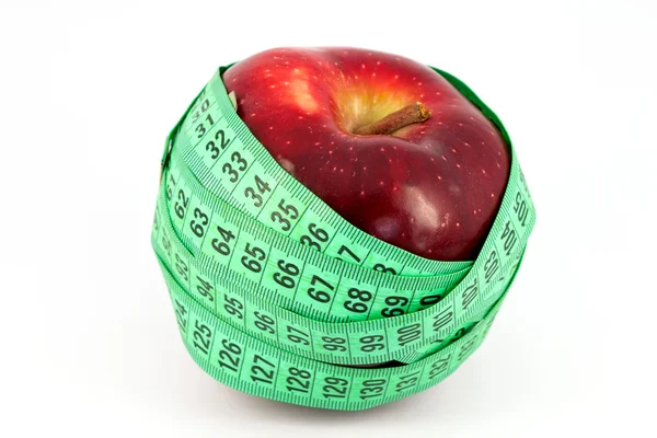 Κόκκινο μήλο και μετρητή — Φωτογραφία Αρχείου