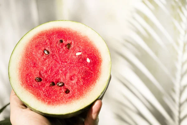 Watermelon on plate, colorful background, tropical healthy fruit.