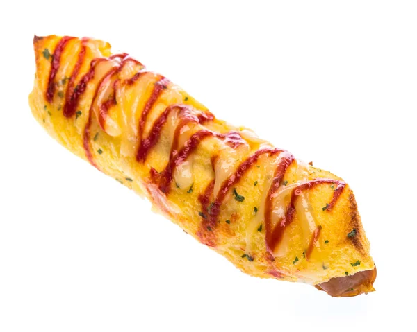 Hot dog s kečupem na bílém pozadí — Stock fotografie