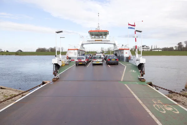 Cars on ferryboat on river rhine in holland near wijk bij duurst — Stock Photo, Image