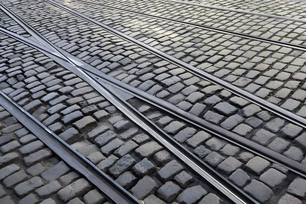 Crossing tram lines on cobblestone street in Ghent — Stock Photo, Image