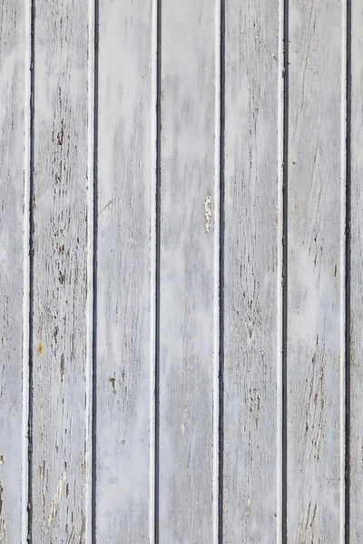 Verticale deel van houten schutting of muur met oude bladdered grijze pa — Stockfoto