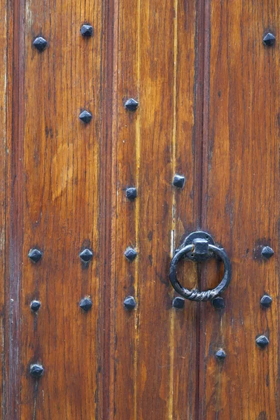 Part of thick very old wooden door of church or medieval buildin — Stock Photo, Image