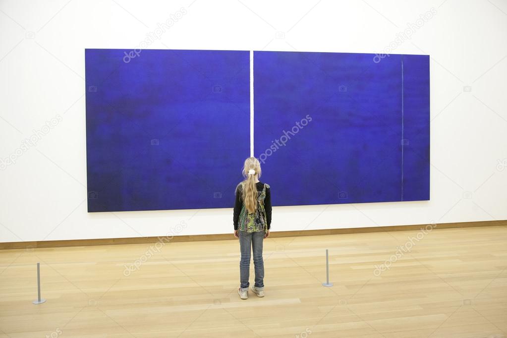 young girl in Stedelijk museum before painring of Barnett Newman