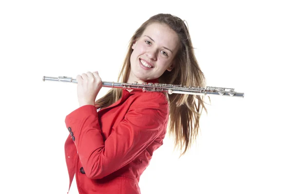 Teenage holds flute in studio — Stock Photo, Image