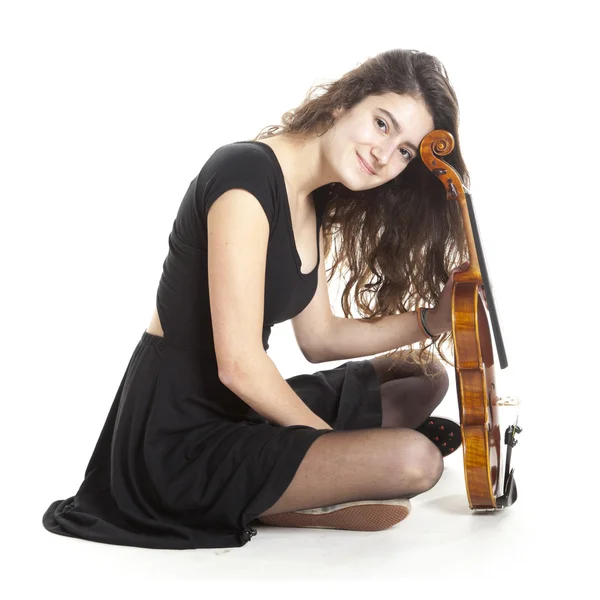 Adolescent fille tient violon en studio — Photo