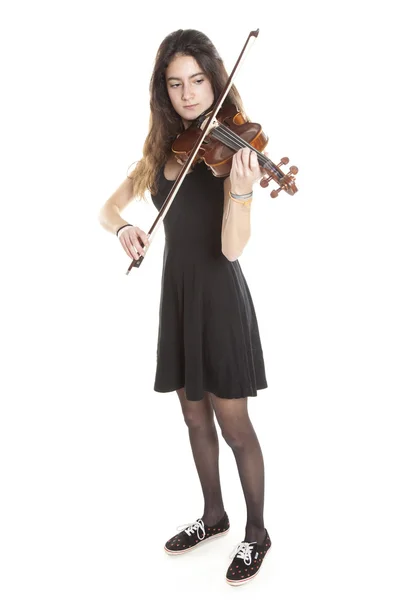 Teenage girl plays violin in studio — Stock Photo, Image