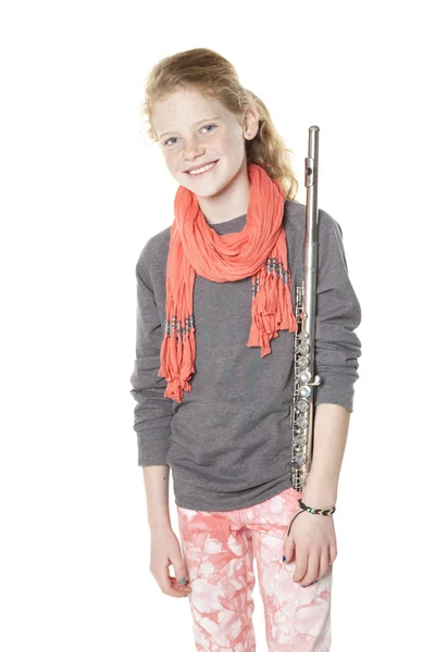 Young girl with red hair and freckles holding flute — Stock Photo, Image