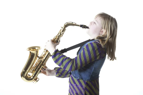 Young blond girl with alto saxophone in studio — Stock Photo, Image