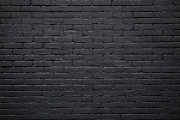 Siyah boyalı tuğla duvar parçası — Stok fotoğraf