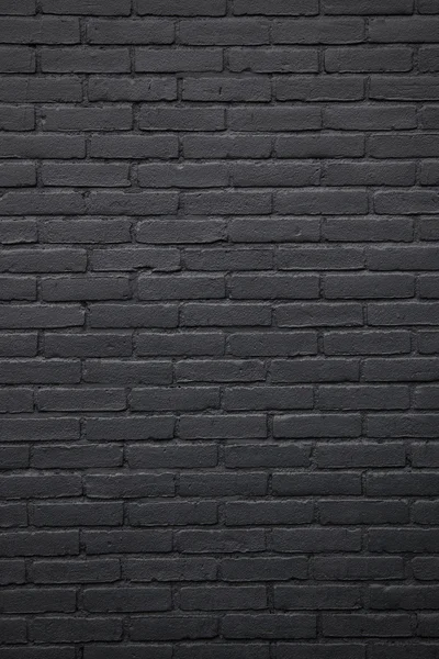 Part of black painted brick wall — Stock Photo, Image