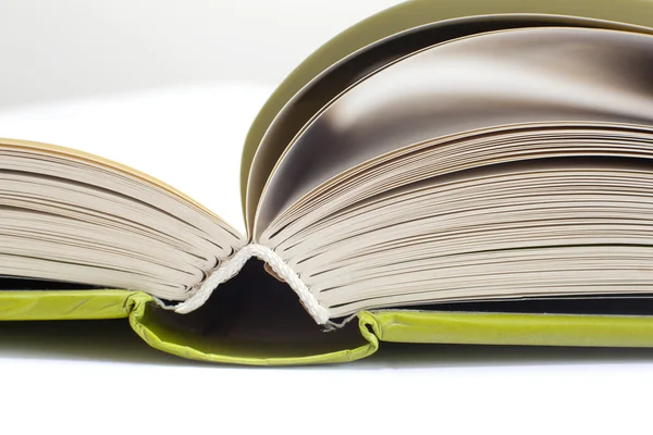 Open book with green cover — Stock Photo, Image