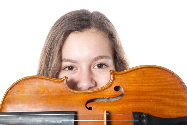 Teenage girl behind violin — Stock Photo, Image