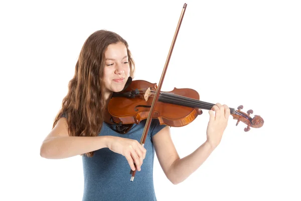 Teenage girl plays the violin in studio Stock Picture
