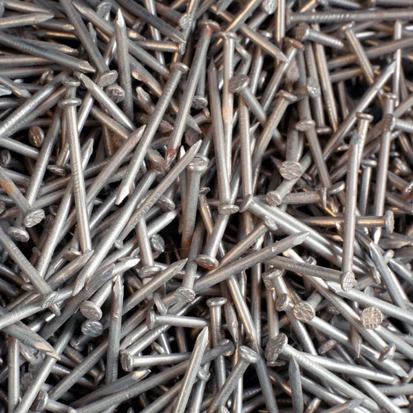 Closeup mnoha železné hřebíky — Stock fotografie