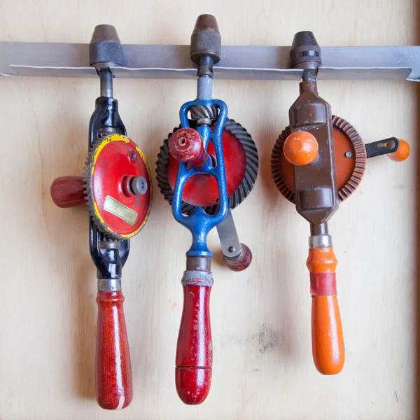 Three old fashioned drills in closet — Stock Photo, Image