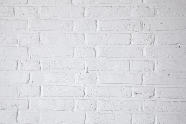 Parte de pared de ladrillo pintado blanco — Foto de Stock