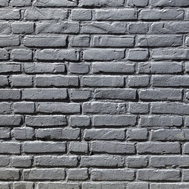 gri boyalı tuğla duvar parçası