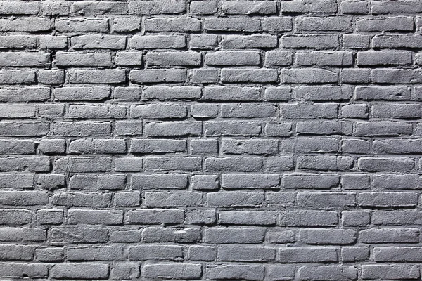 Parte da parede de tijolo pintado cinza — Fotografia de Stock