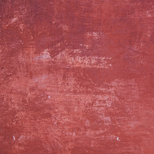 Pattern on part of wall with red plaster — Stock Photo, Image