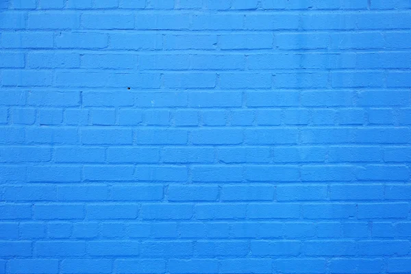 Horizontaler Teil der blau gestrichenen Ziegelwand — Stockfoto