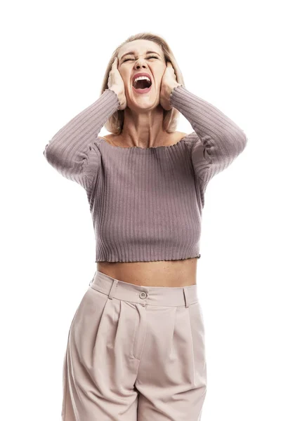 Young Woman Screams Holding Her Head Her Hands Blonde Pink — Stock Photo, Image