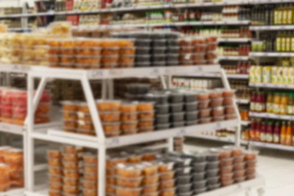 Comida Enlatada Frascos Nas Prateleiras Supermercado Loja Interior Desfocado — Fotografia de Stock