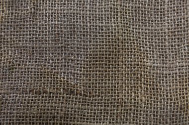 Kahverengi kirli tuval dokusu. Yakın plan. Geçmişi. Metin için boşluk