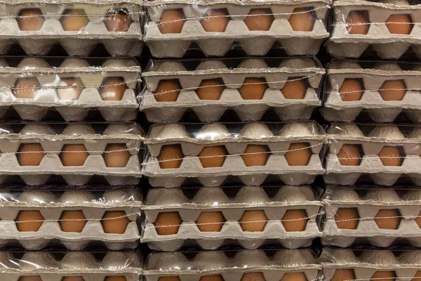 Eggs in cartons at the store. Healthy eating. Close-up.