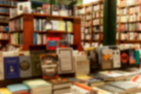 The interior of a large bookstore. Blurred. Education and culture.