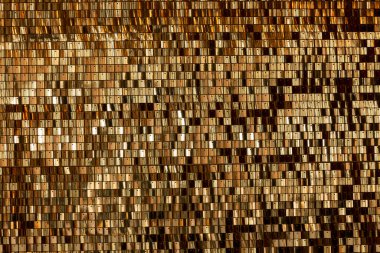 Altın metalik parlak plakalar. Şenlik arka planı. Metin için boşluk.